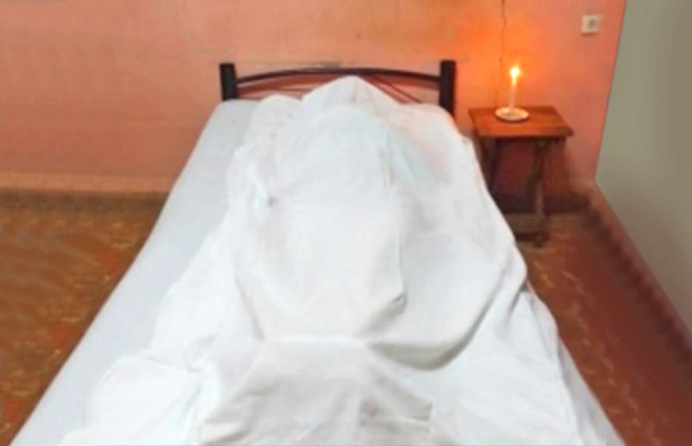 Junto al cadáver de su hijo por más de dos días una madre clama ayuda para sus honras fúnebres en Barrancabermeja imagen de la publicación